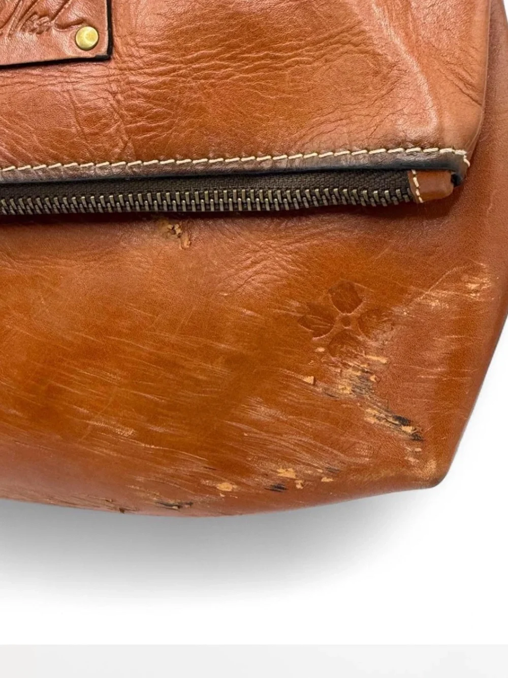 Patricia Nash leather fold-over wristlet clutch